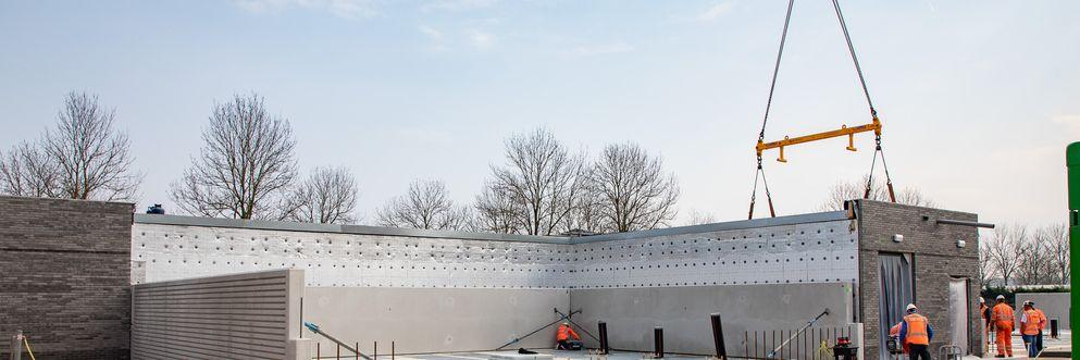 BAM Alliander Qirion Liander energie transitie duurzaam slim sneller bouwen standaardiseren  vaste teams efficient versnellen versneld tempo
