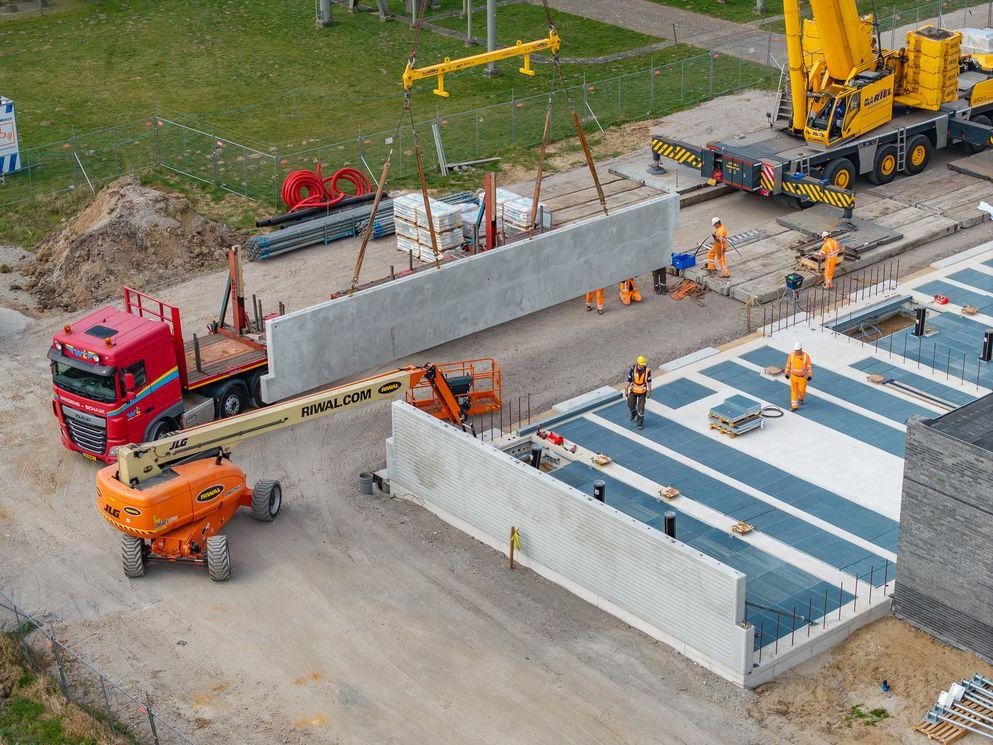 BAM Alliander Qirion Liander energie transitie duurzaam slim sneller bouwen standaardiseren  vaste teams efficient versnellen versneld tempo