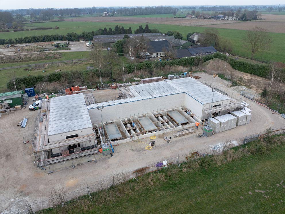 BAM Alliander Qirion Liander energie transitie duurzaam slim sneller bouwen standaardiseren  vaste teams efficient versnellen versneld tempo